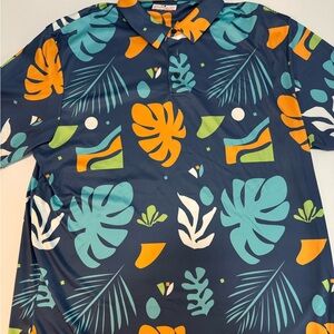 Grand Slam Tropical Leaf Polo in Navy with Teal & Orange Accents